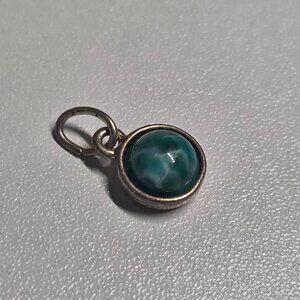 Green Swarovski Stainless Steel Charm Not a real gemstone! Flat back. Cond